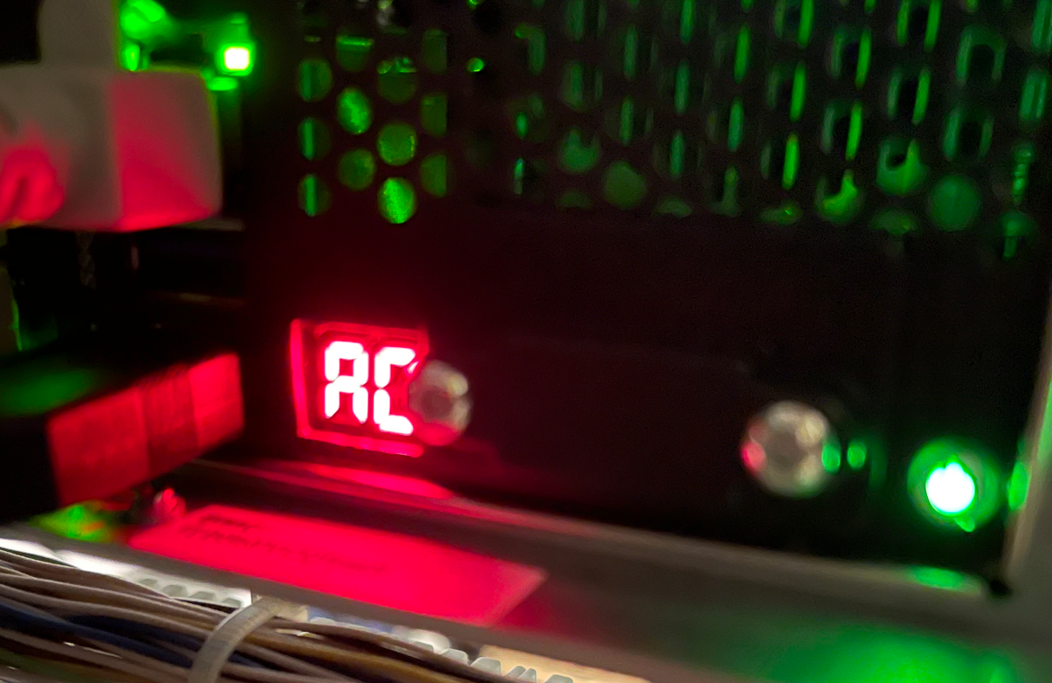 What is the meaning of the A0 LED code and the other codes located on the rear of DIP 7000 AIO gen4 unit.png